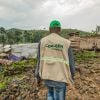 Concern staff member surveys latrine construction in DRC