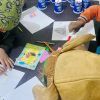 Children do art at a non-formal education (NFE) school in Northern Syria
