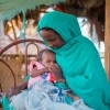 Malaz feeds her two-year-old Aida ready-to-use-therapeutic food at her home in Kassala State. During the mass mid-upper arm circumference (MUAC) screening and referral for children under five, Aida was confirmed severely malnourished. She was very weak and immediately referred to Al-Arab health facility for treatment. (Photo: Ahmed Elfatih Mohamdeen/UNICEF)