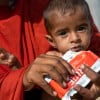 Rashida holds her severely malnourished son, Rasheed (15 months), while feeding him RUTF in Ahmed Jotorr village, Tharparkar. (Photo: Arif Shad/Ingenious Captures/Concern Worldwide)