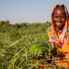 Mahadia Gamar (24) showcases her watermelon at her farm in Karo village, Chad. (Photo: Eugene Ikua/Concern Worldwide)