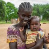 Adut with her daughter Axlam (nine months) at the Lueth Ngor PHCU (Public Health Care Unit) in Aweil North. Photo: Eugene Ikua/Concern Worldwide