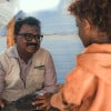 Concern Yemen Country Director Victor Moses chats to a child in Al-Anad IDP site in Lahj Governorate where Concern, with support from Irish Aid, provided shelter and WASH assistance to IDPs affected by a major sandstorm. Photo: Ammar Khalaf/Concern Worldwide