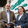 Concern Worldwide Chief Executive Officer Dominic Crowley and Chair Rosalyn Tamming with the 2025 Annual Report. Photo: Jon Hozier-Byrne/Concern Worldwide