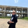 Journalist Orla Guerin standing outside an abandoned building in Taiz, Yemen
