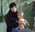 Ayesha, a Rohingya mother, with her son Anwar