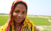 Rina Begum (32) outside Fuljhar primary school, Bangladesh. Photo: Jennifer Nolan / Concern Worldwide.