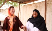 Mary Robinson with healthworker Nadhifa Ibrahim Mohamed. She has worked in Dollow Health Centre  for 3 years and is a certified midwife, Dollow, Somalia. The Somali district of Dollow is situated on the Somali / Ethiopian border.  Dollow town, the district capital, is the border crossing point and is contiguous with Dollow Ado on the Ethiopian side. Dollow is a key transit point between Somalia and Ethiopia in the current crisis with over 1,700  crossing between the two countries on a daily basis. To date 7