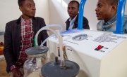 Engineering students with a suction machine they designed for clearing a newborn’s airwaves. Photo: Concern Worldwide. 