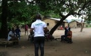 Concern's Learning Coach Mohamed Gobril Sesay raising awareness on COVID-19.