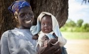 Agel and her baby Kuek were struggling with malnutrition in South Sudan. Concern taught Agel how to grow a vegetable garden. Photo: Abbie TraylerSmith / Concern Worldwide