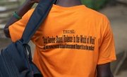 Andrew from Liberia proudly sporting his 16 Days of Activism t-shirt.