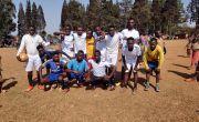 Football team participating in HIV/AIDS awareness campaign in Rwanda