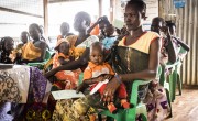 Nyahok Diew waits to be seen at the health care clinic with her 10-month-old daughter, Nyariek. Photo: Ed Ram/Concern Worldwide