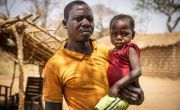 Guy Wanape with his son Sandrene Wanape in Ngata village