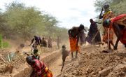 Group of farmers digging canal in Turkana County, Kenya