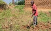Man tilling the ground in Burundi