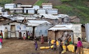 An IDP camp in DRC is built on ground made of broken volcanic rocks, and heavy rains almost daily leave the ground muddy and wet, making it inhospitable and sometimes impassable for people using crutches or wheelchairs. (Photo: Concern Worldwide)