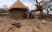 ReGRADE programme participant Abuhay Ejigu and his family infront of their home in Kinfanz. (Photo: Eugene Ikua/Concern Worldwide)