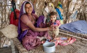 Jamna holding her daughter Shanti