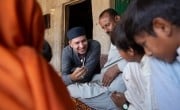 Ali Salman Anchan along with Mumtaz Ahmed interact with Maula Dinno's family in their home in Sindh. (Photo: Zoral Khurram Naik/DEC/Concern Worldwide)