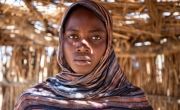 Dijda* (20) in her home in refugee camp in Eastern Chad. Dijda* received kitchen items from Concern Worldwide, as well as a mattress and blankets. (Photo: Eugene Ikua/Concern Worldwide)