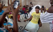 Djenise Hilaive takes part in a hair and make-up training session