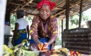 Favor B Tarr, with some of the produce from her vegetable farm at Kaytor Town, Grand Bassa, Liberia. The community is being supported by Concern in an integrated program called IFANCI, funded by the LDSCC. (Photo: Kieran McConville/Concern Worldwide)