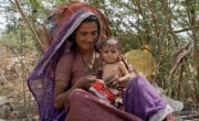 Jamna feeds her daughter Shanti RUTF in Sindh, Pakistan. (Photo: Arif Shad/Ingenious Captures/Concern Worldwide)