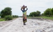 Nyakhan Kier carrying materials from Leer to Bentiu, Unity State