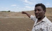 Head of Hamsit Kebele Agriculture office Mulu Chorie showcases the area covered by the Cherkos community watershed. Photo: Eugene Ikua/Concern Worldwide