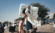 The Concern Yemen team distribute shelter materials to people affected by the sandstorm that struck Al Anad IDP Camp, Tuban District. Photo: Ammar Khalaf/Concern Worldwide
