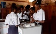 Students in Maikona girls Secondary school take part in a science experiment, using mobile labs facilitated by Datatec and Concern Worldwide. Photo: Shaloam Strooper/Concern Worldwide