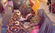 Students in Tahoua build their literacy skills with an educational game. Photo: Concern Worldwide