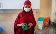 A Concern health worker prepares therapeutic milk at the stabilisation centre at Banadir Hospital, near Mogadishu. Photo: Mustafa Saeed/Concern Worldwide