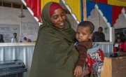 Hoodo* had Mulki* shortly before leaving home for safety near Mogadishu. Concern health workers at the Siinka-Dheer Health Centre treated Mulki for malnutrition. (Photo: Eugene Ika/Concern Worldwide)