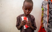 Abdul Alhadji (age 5), eats a course of Plumpy'Nut at home in Lac Province, Chad. Photo: Eugene Ikua/Concern Worldwide