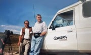 Concern Humanitarian Ambassador Dominic MacSorley with a colleague in Kosovo, 1999