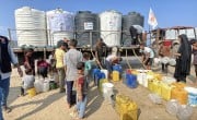 With support from Concern, CESVI distributes over 1,300 gallons of water daily to Al-Zawaida in Gaza. (Photo: CESVI/Concern Worldwide)
