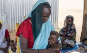 Khadidja* attends the health and nutrition centre with her baby daughter Yassira*