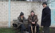 Locals chatting in Mala Rohozyanka, Kharkiv Oblast. Photo: Jon Hozier-Byrne/Concern Worldwide