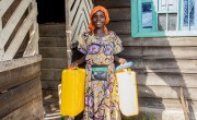Florence* collects a household and hygiene kit from Concern DRC. Photo: Concern Worldwide