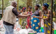 Participants in the SAFER programme collect household and hygiene kits from Concern at the Kirotshe distribution site. Photo: Concern Worldwide