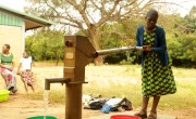 Caroline Nkhata (13) collects water at a bore hole pump set up by Concern in, Masekese Village, Malawi. Photo: Jon Hozier-Byrne/Concern Worldwide