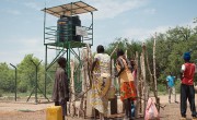 People collect water from the Concern Borehole at the Irish Aid-supported public health clinic in Lueth Ngor, Aweil North, Northern Bahr el Ghazal. Photo: Hannah Bolder/Concern Worldwide