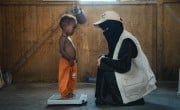 Child being weighed at Yemen malnutrition centre