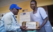 Rashid Moloah of Concern Worldwide delivers soap to a peripheral health unit in rural Tonkolili district, Sierra Leone. The supplies were provided as part of Irish Aid's larger package of assistance to Sierra Leone during the 2014-16 Ebola outbreak. Photo: Kieran McConville/Concern Worldwide