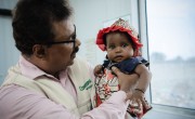 Concern’s Yemen Country Director Victor Moses meets a child