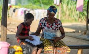 Helena reading with her son Steward