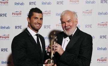 Tom Arnold, pictured with Irish International Rugby Player, Rob Kearney after he received his 2013 People of the Year Award at the 39th Annual People of the Awards Ceremony organised by Rehab held in the CityWest Hotel, Co. Dublin. Photo: Robbie Reynolds.